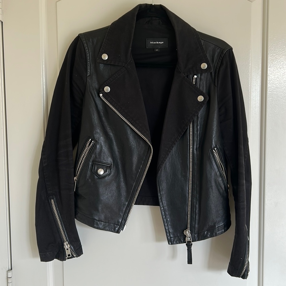 Black denim jacket with supple leather torso and silver hardware Moto jacket